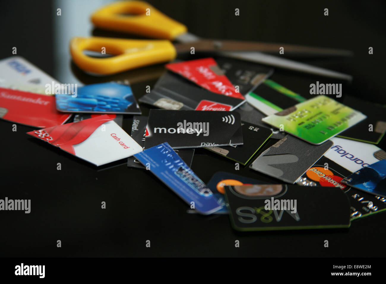 Credit cards cut into pieces Stock Photo Alamy