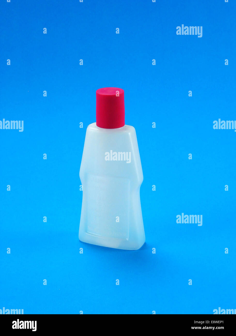 Dispenser bottle with red cap Stock Photo Alamy