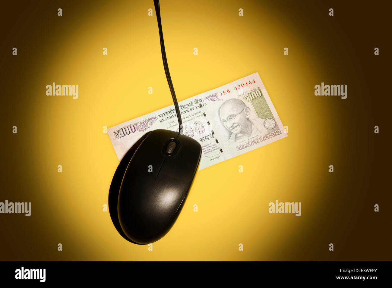 indian Rupee with Computermouse Stock Photo Alamy