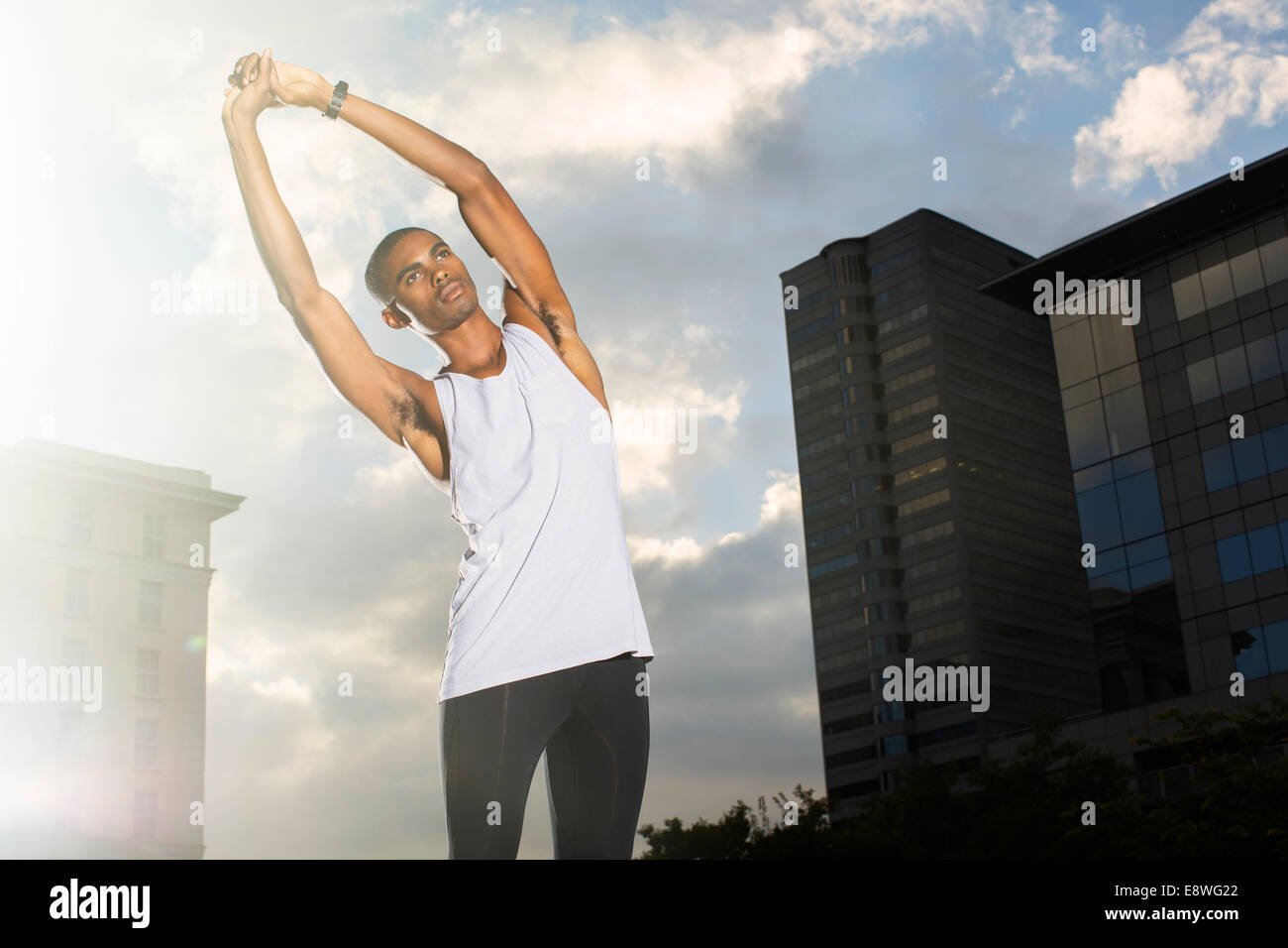 Stretching man hi-res stock photography and images - Alamy