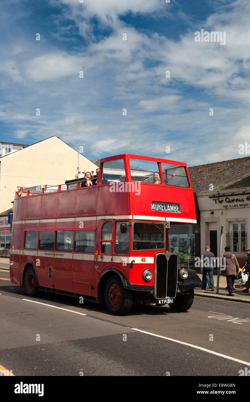 UK, England, Lancashire, Morecambe, vintage open top bus running along Marine Road Stock Photo