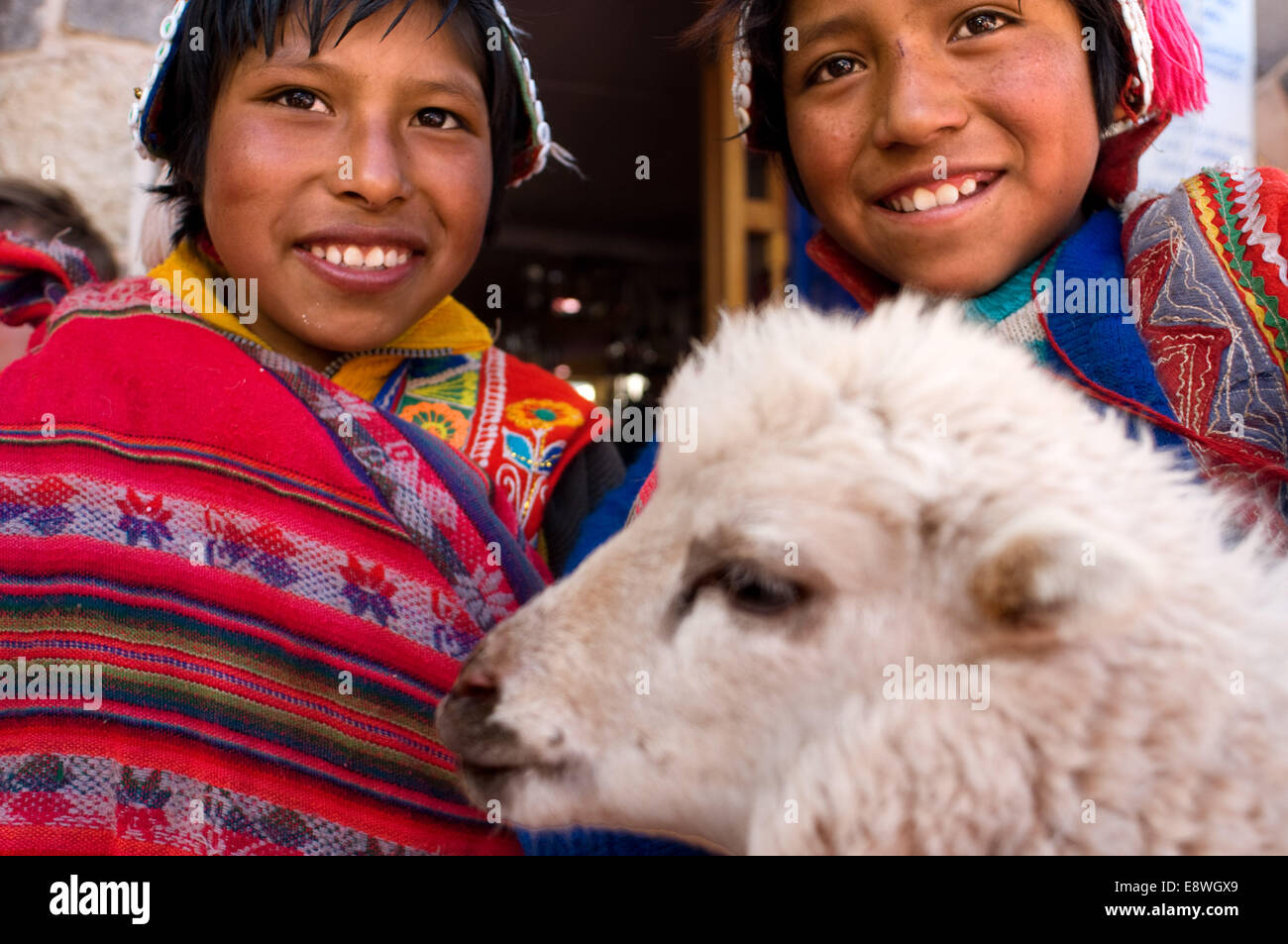 Children dressed in traditional costume in Pisac Sunday market day. Pisac. Sacred Valley. Pisac, or Pisaq in Quechua, is a small Stock Photo
