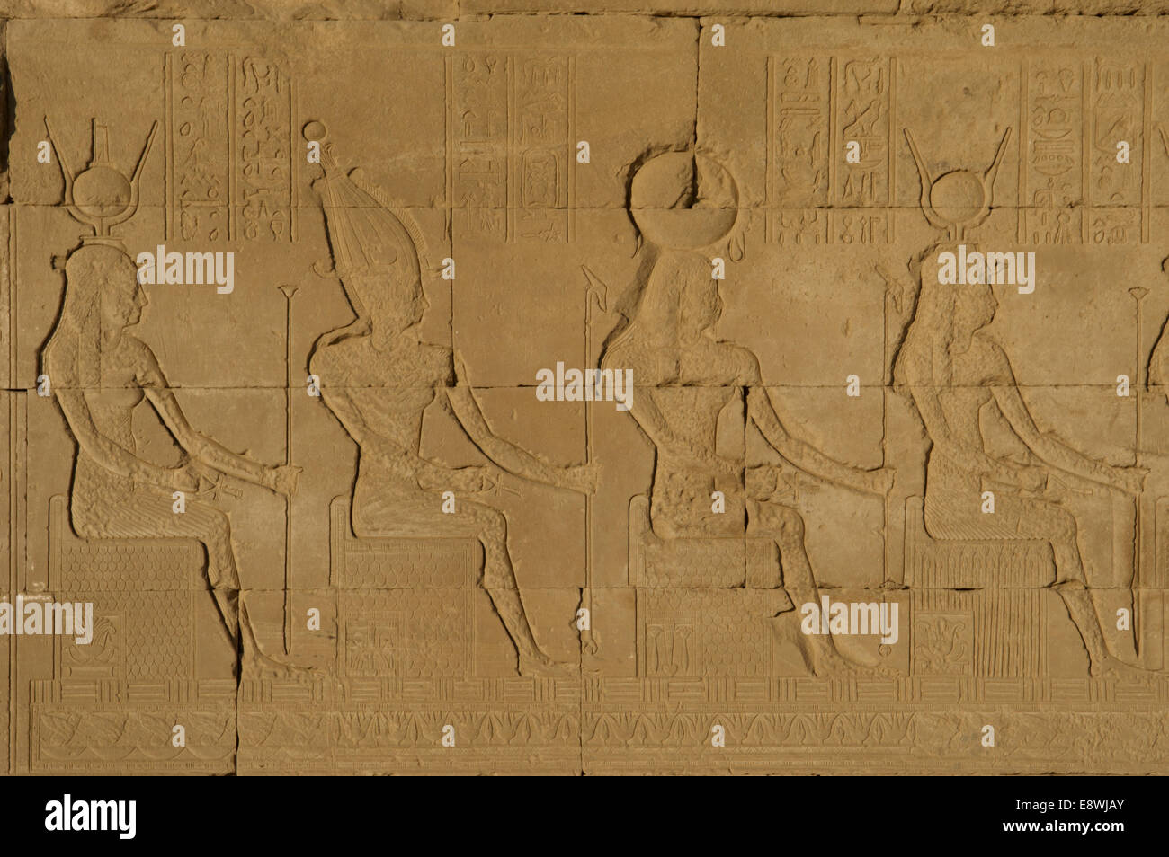 Egyptian Art. Dendera. Temple of Hathor. Deity seated. Relief. Stock Photo