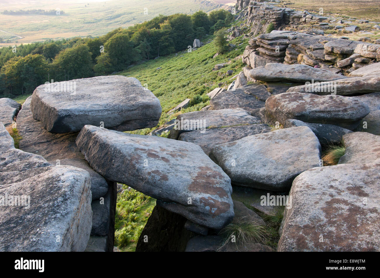 Rocks balancing on Stanage edge, Derbyshire, Peak District. A dramatic landscape popular with walkers and climbers. Stock Photo