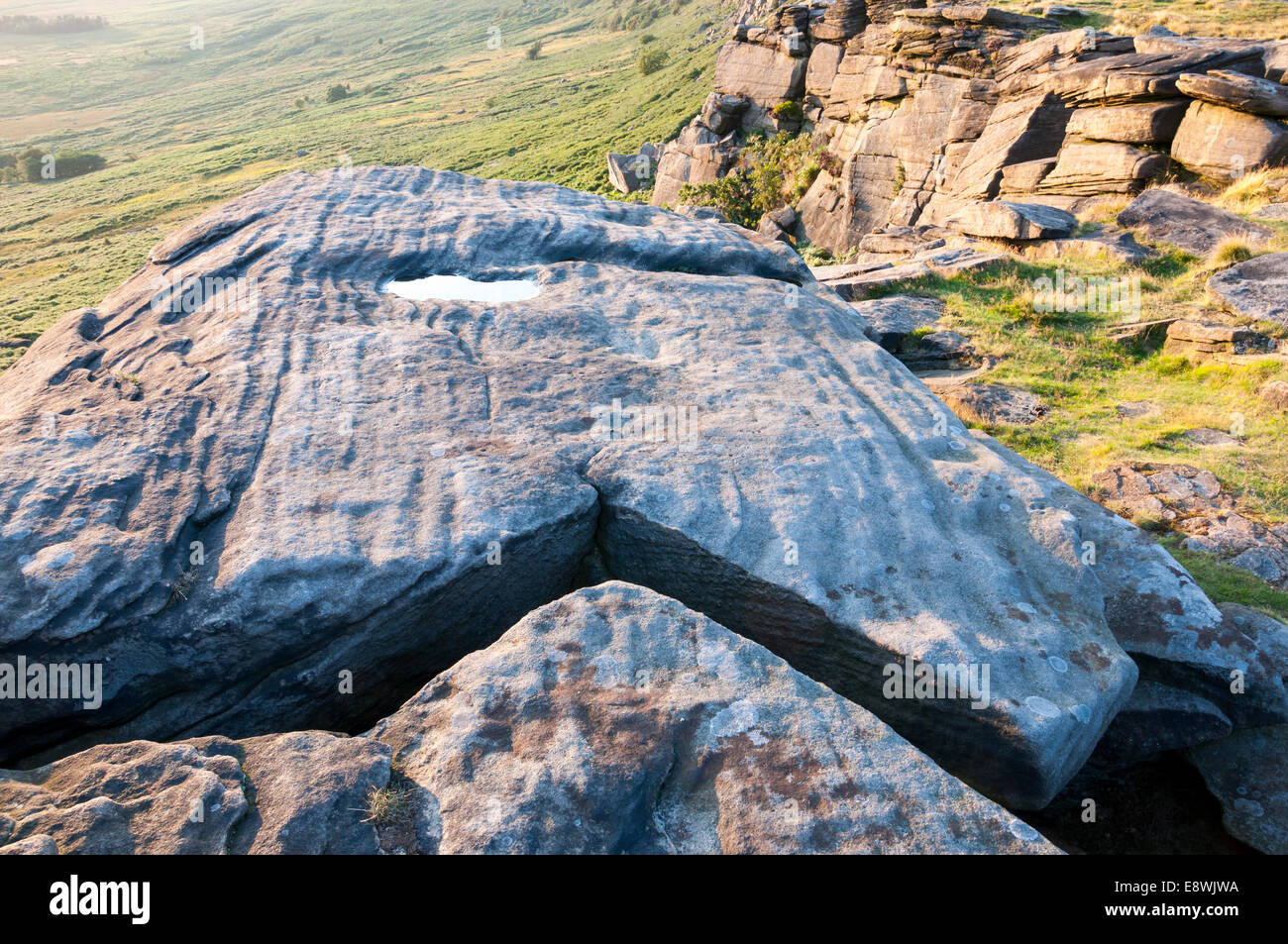Crack in rocks at Stanage edge Stock Photo