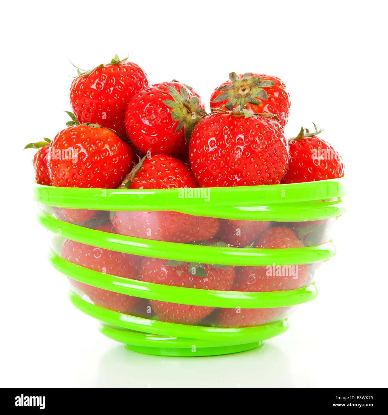 Bowl with fresh strawberries over white background Stock Photo - Alamy