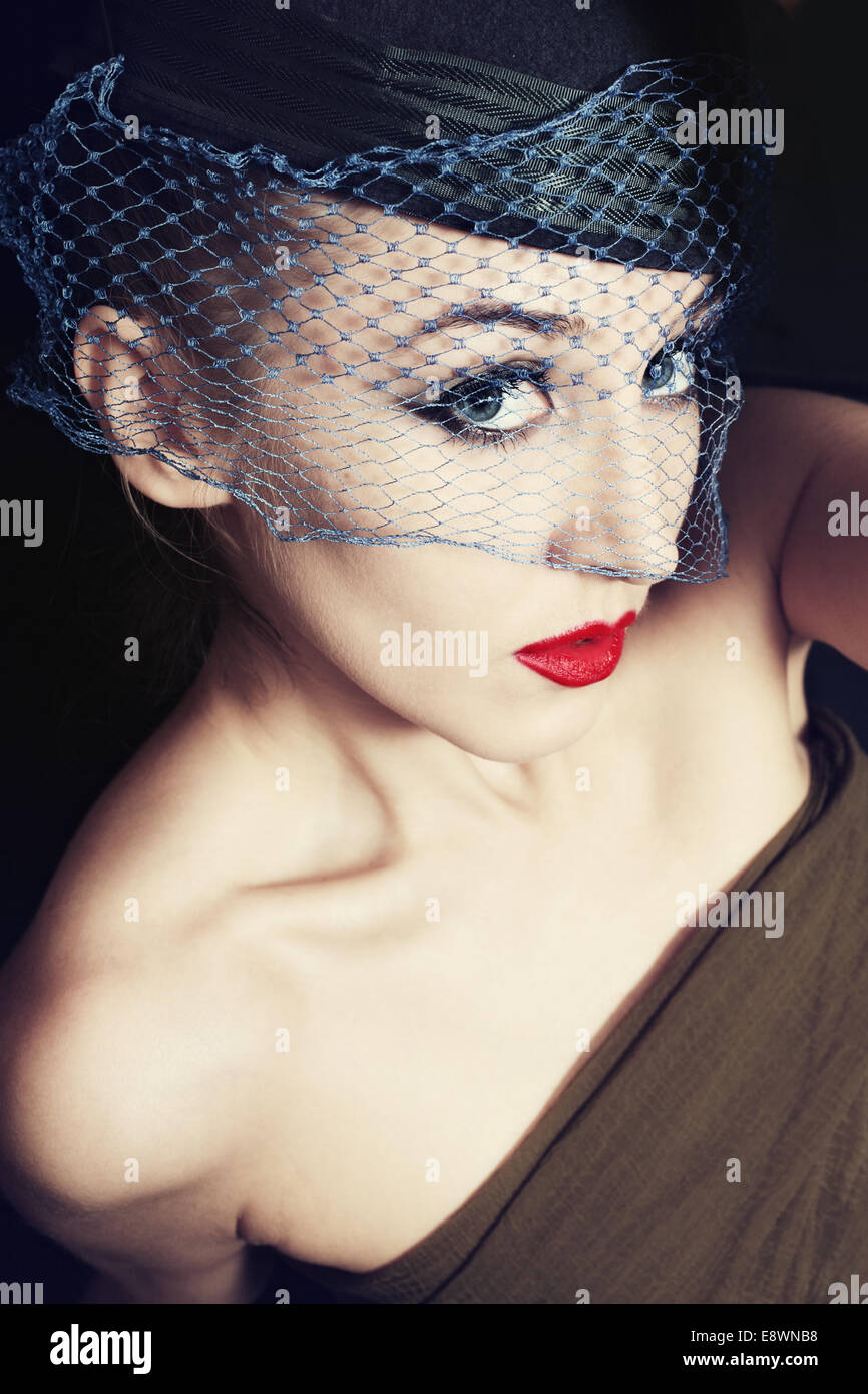 Portrait of beautiful young woman wearing veil and hat. retro Style ...
