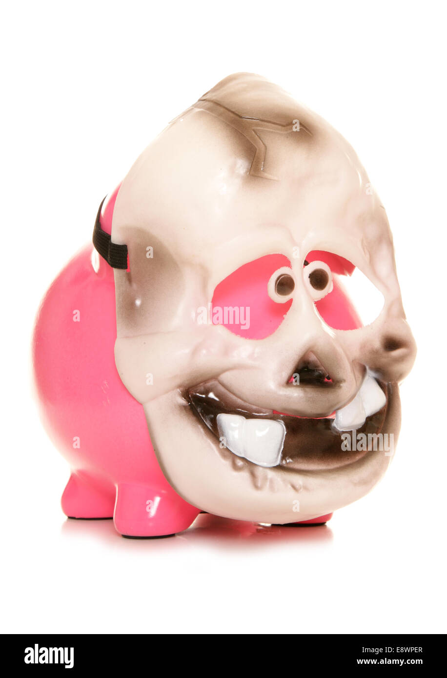 Piggy bank wearing a skeleton halloween mask cutout Stock Photo Alamy