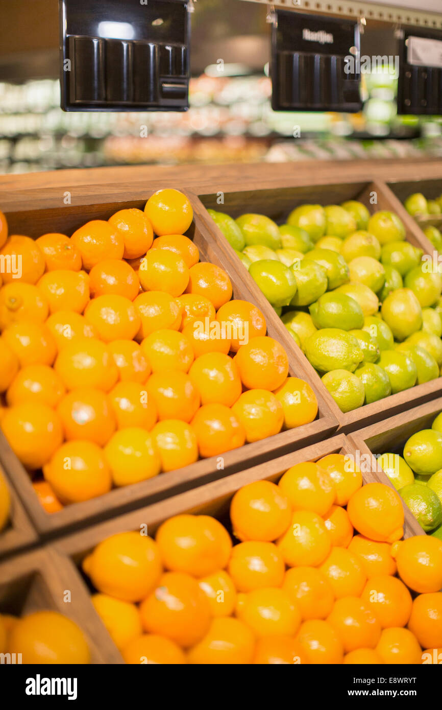 Close up of fruit for sale in produce section of grocery store Stock