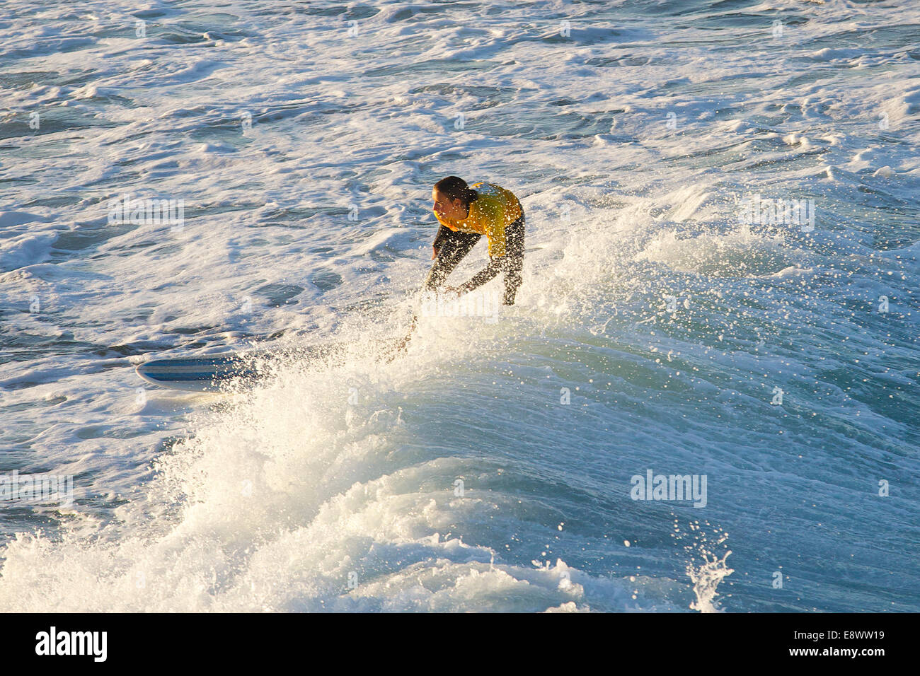 Surfing At Sunrise. Hermosa Beach, California Stock Photo - Alamy