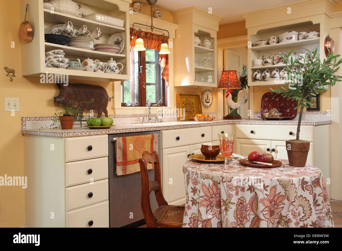 Country Style Kitchen With Open Shelving And Tile Countertop In
