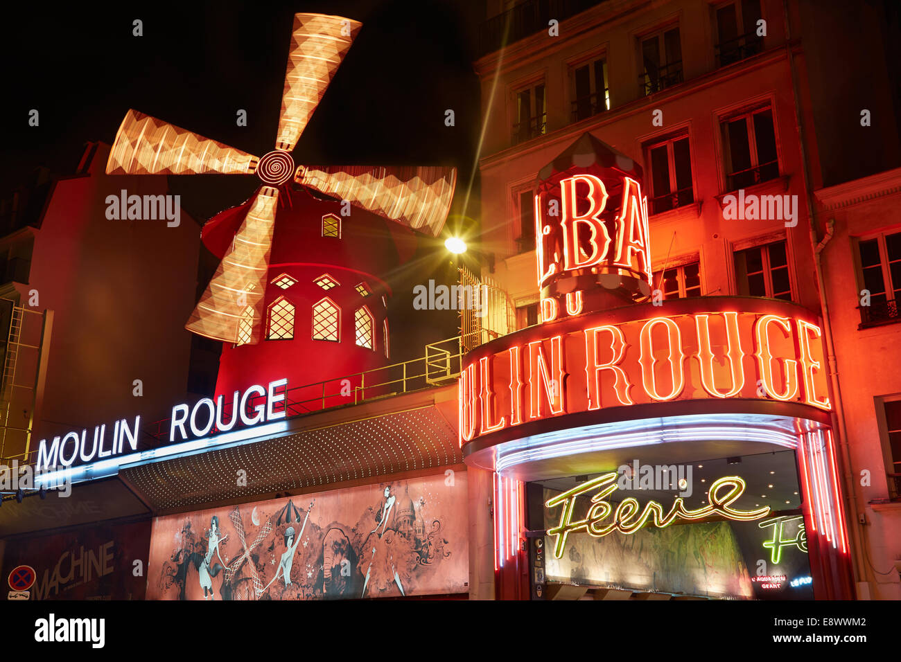 Moulin Rouge by night in Paris Stock Photo