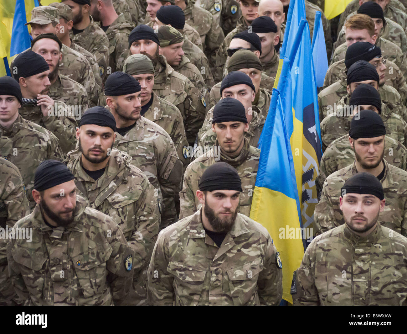 Soldiers of Azov volunteer battalion take part in a march that was ...