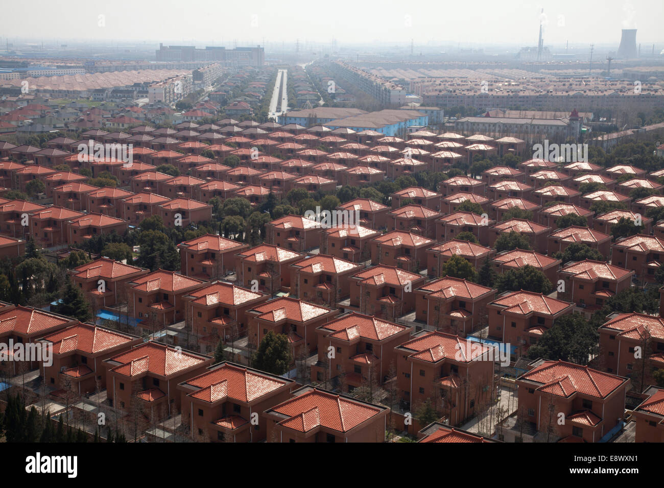 View of private villas, factories, apartment blocks, working farmland and construction sites in Huaxi Village, Jiangsu, Chinas most densely populated province Since 2006, Jiangsu has been Chinas largest recipient of direct foreign investment. Stock Photo