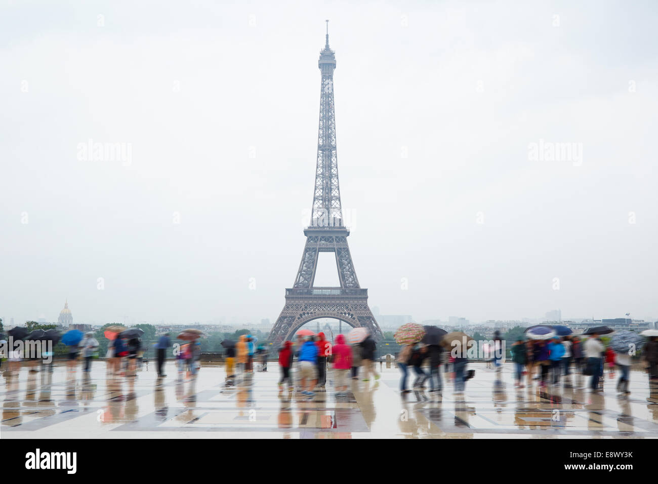 Eiffel tower in Paris with tourists and rain from Trocadero Stock Photo