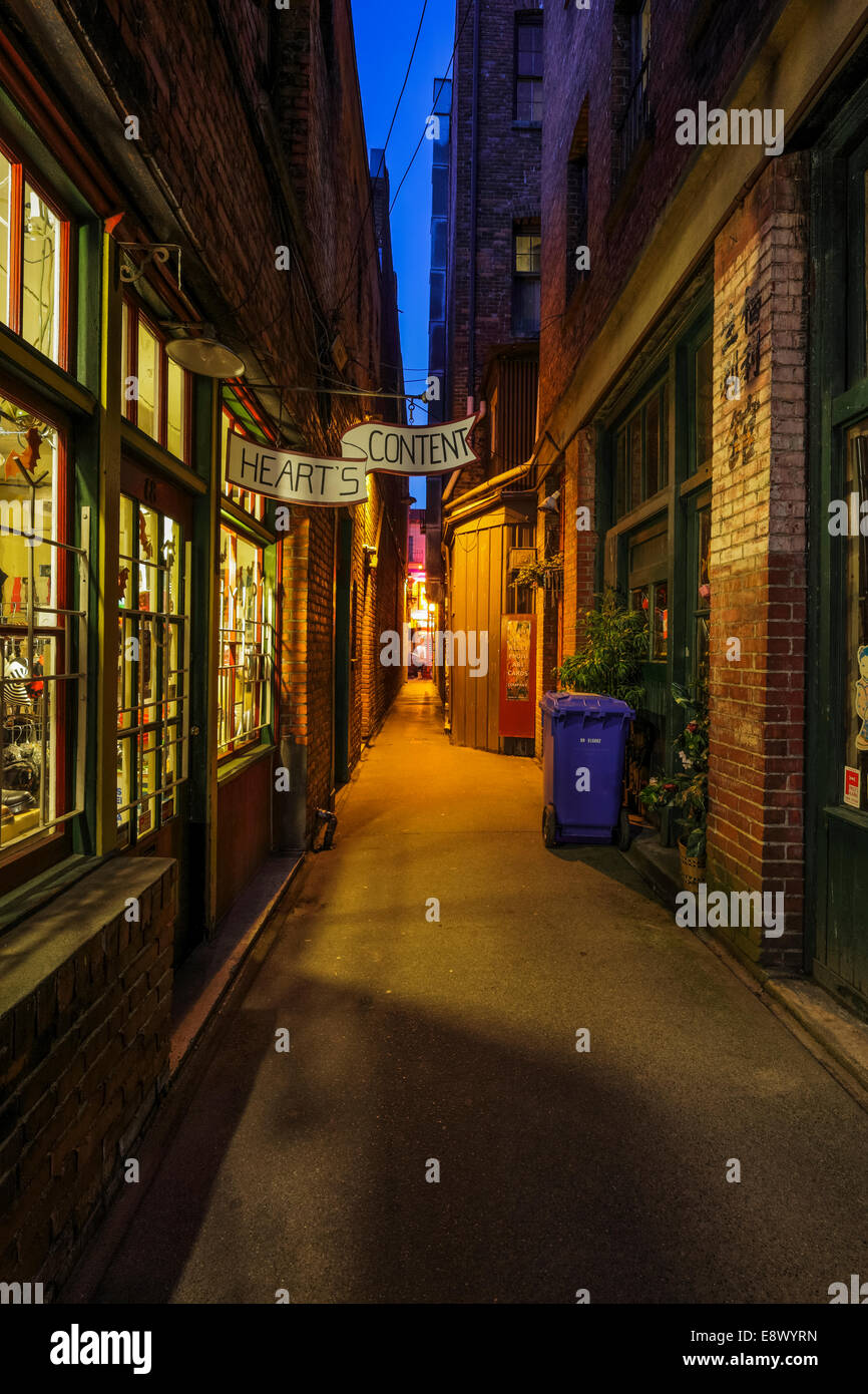 Fan Tan alley world's narrowest street in Chinatown at night-Victoria, British Columbia, Canada. Stock Photo
