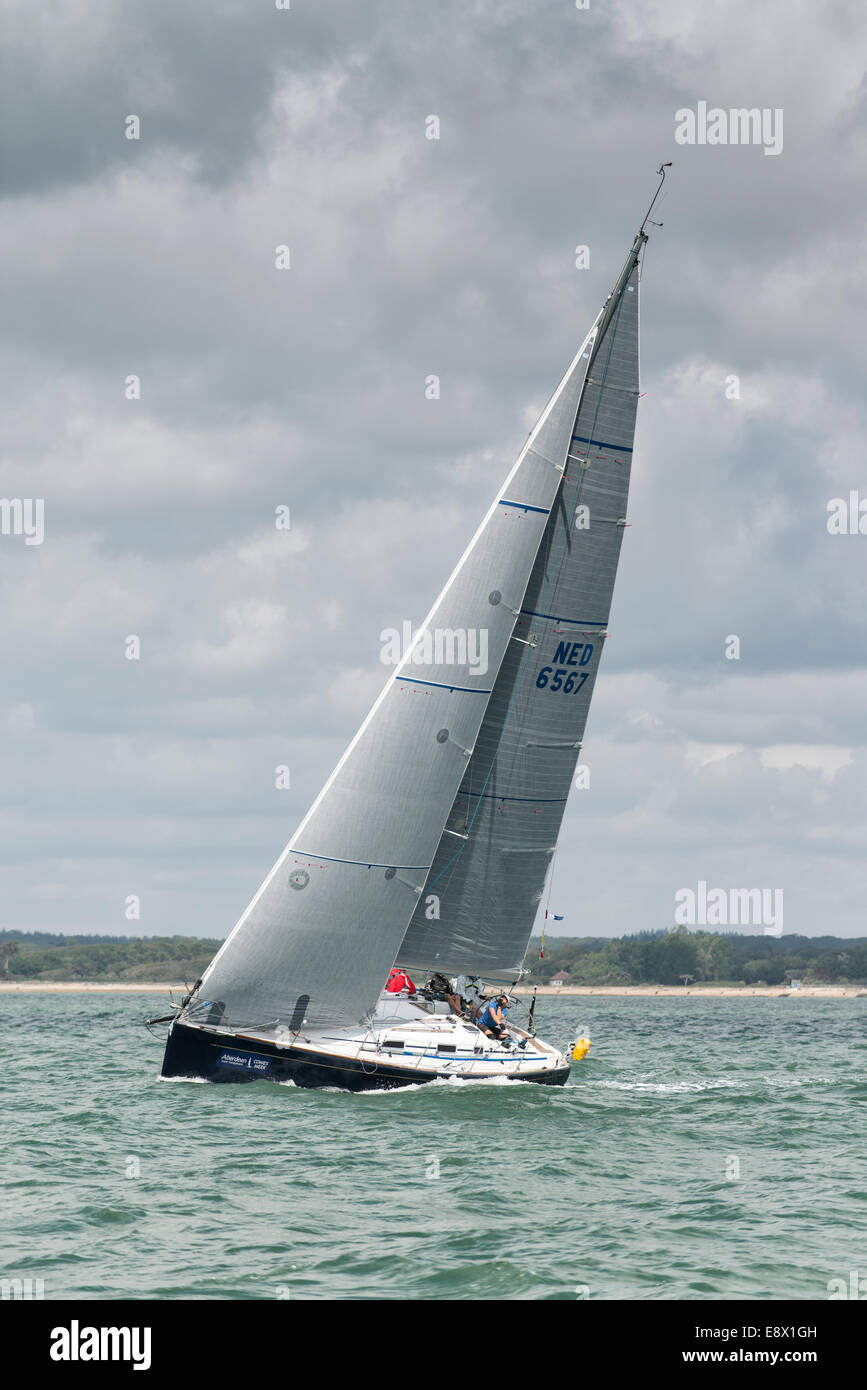 Grand Slam a Grand Soleil 40 with sail number NED6567 from the Netherlands racing in the Solent during the Cowes Week Regatta. Stock Photo
