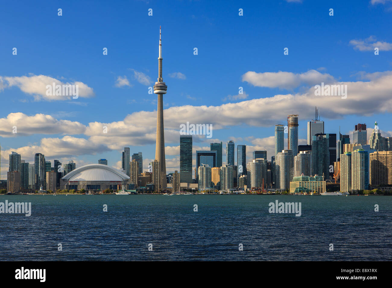 Famous Toronto Skyline with the CN Tower and Rogers Centre taken from the Toronto Islands. Stock Photo