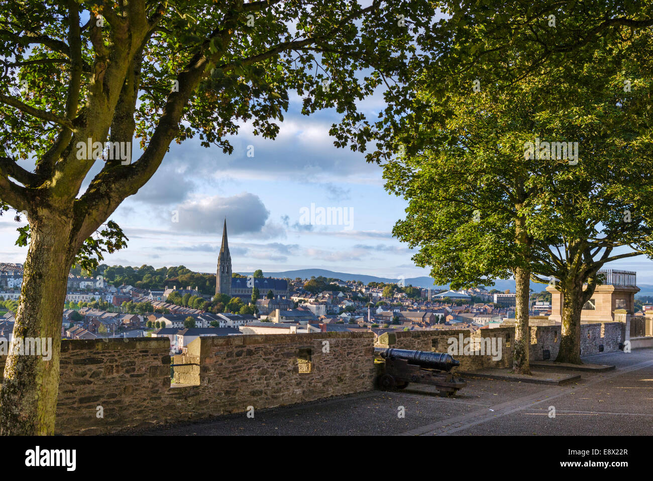 Old city walls in the early evening with St Eugene's Cathedral in the distance, Derry, County Londonderry, Northern Ireland, UK Stock Photo