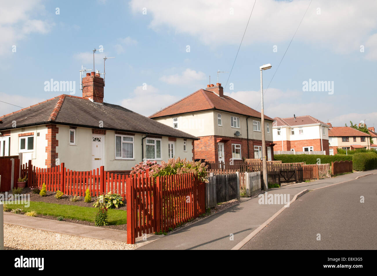 Postwar housing in an empty Dudley street with brick 1940s council