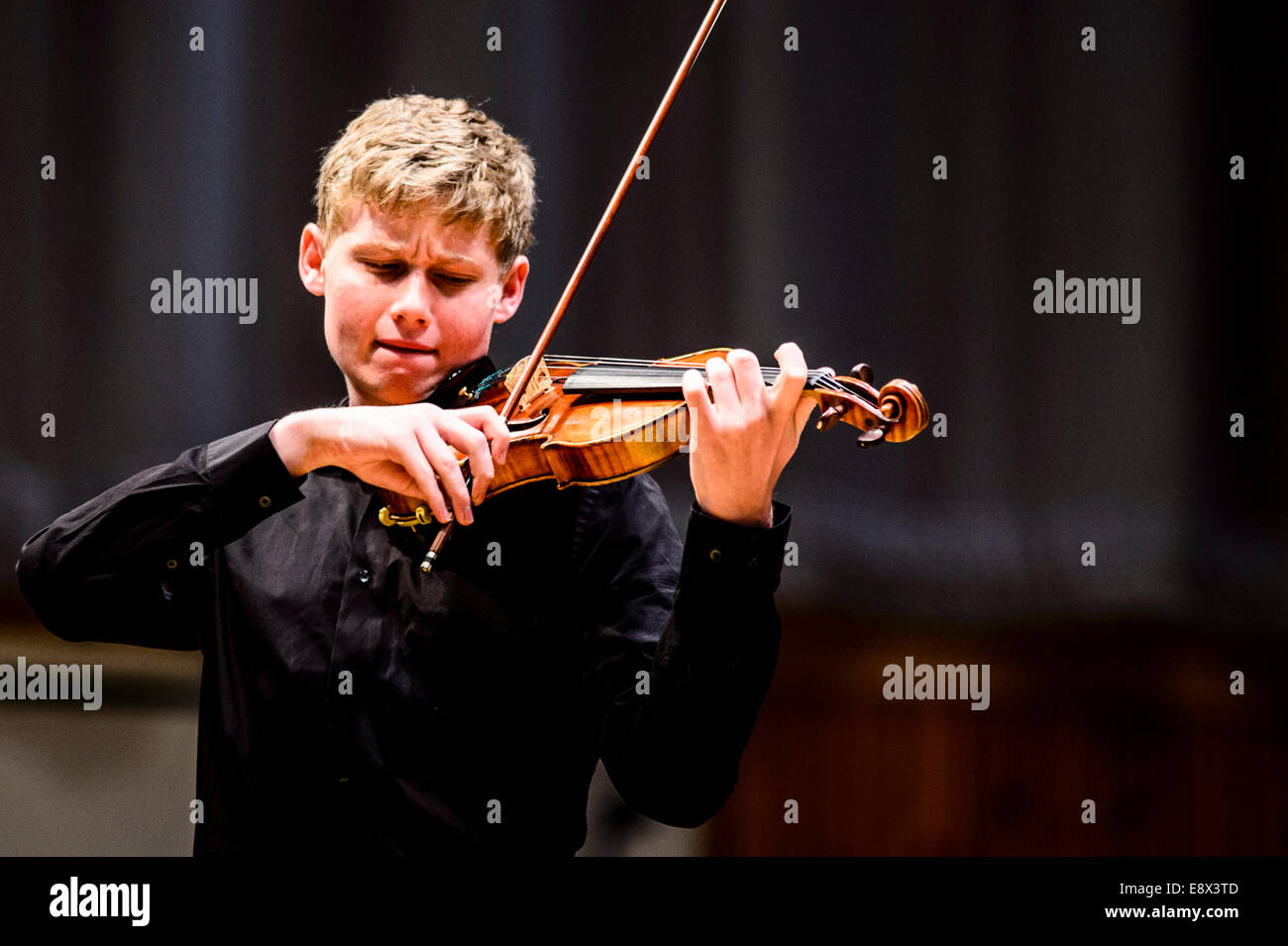 Strings: A Young teenage boy male musician violinist performing at Aberystwyth MusicFest 2014 Stock Photo