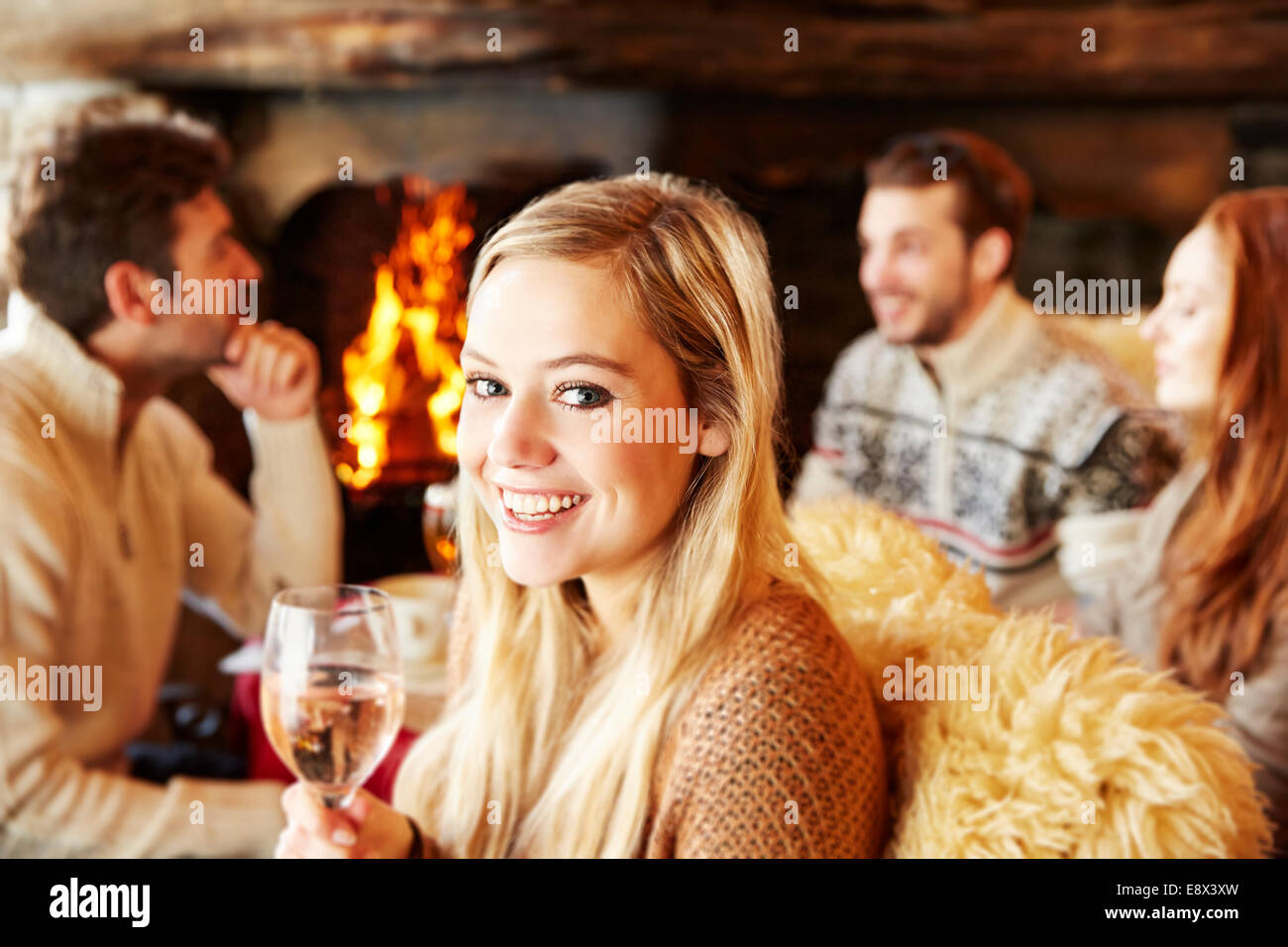 Woman enjoying drinks with friends Stock Photo