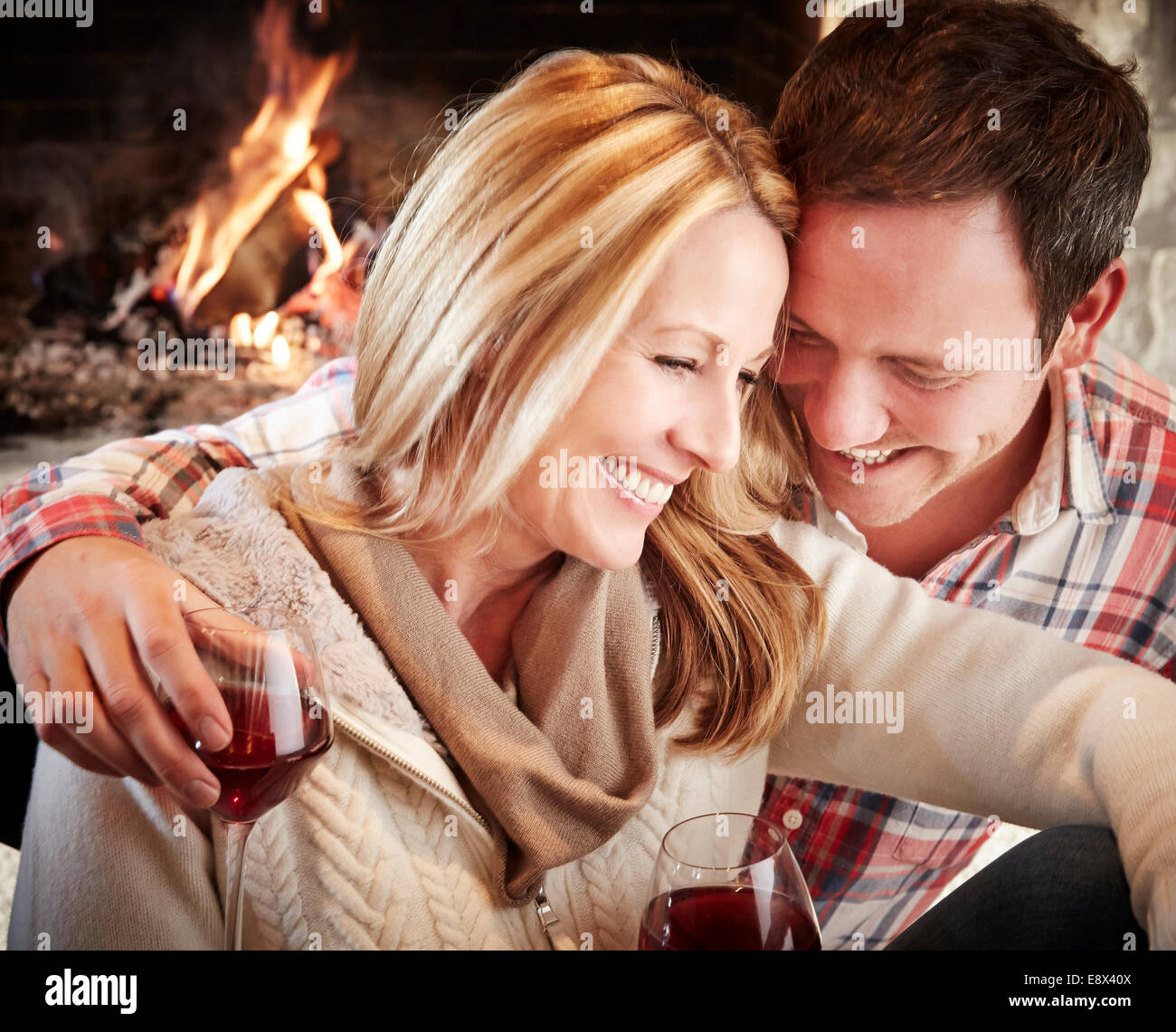 Couple enjoying drinks together Stock Photo