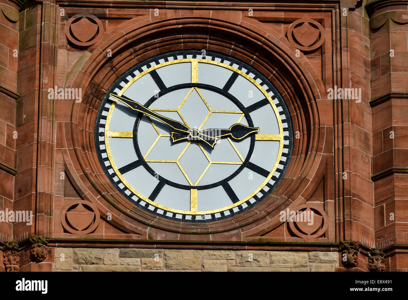 Stock Photo - Clock face on The Guildhall, Derry, Londonderry, Northern Ireland. The Guildhall clock is a replica of London's Bi Stock Photo