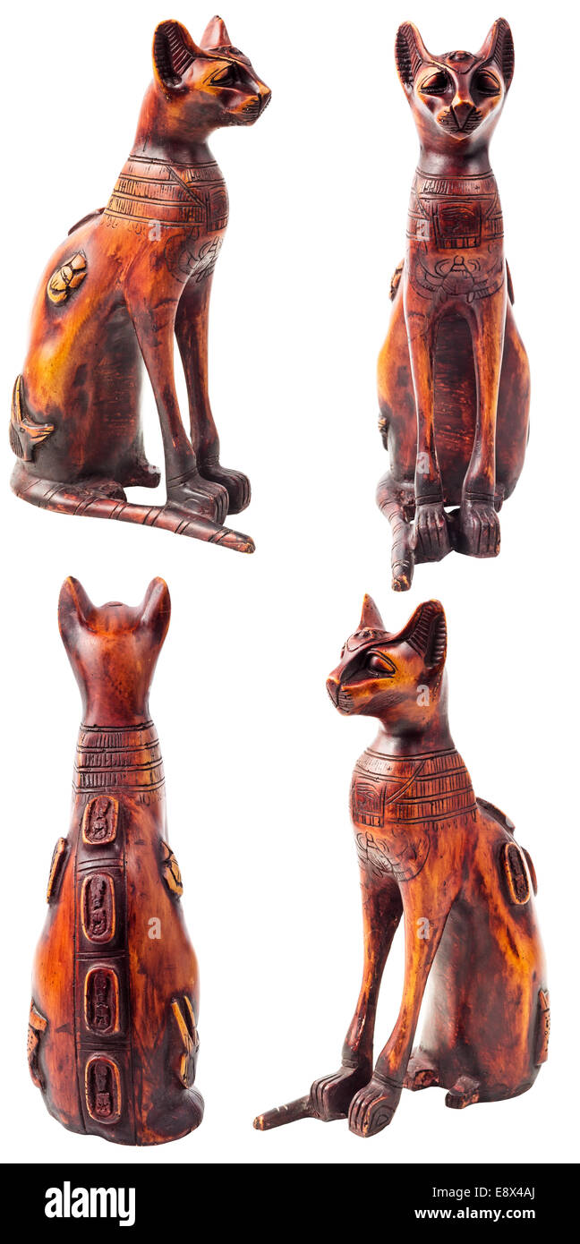 Ancient wooden Egyptian cat statue isolated on white background