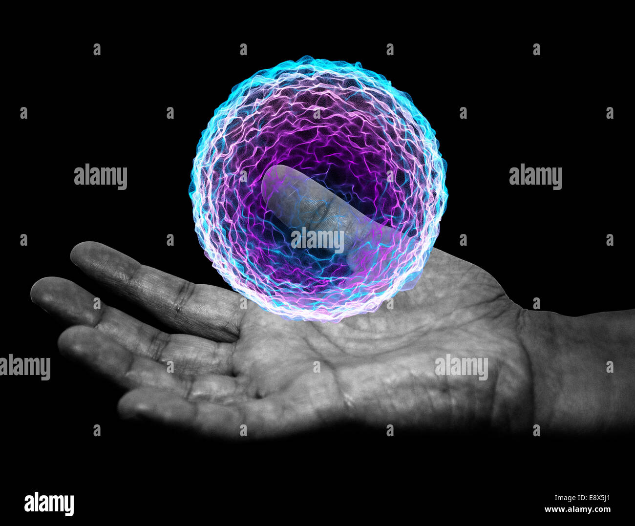 Hand with witch magic spell ball Stock Photo