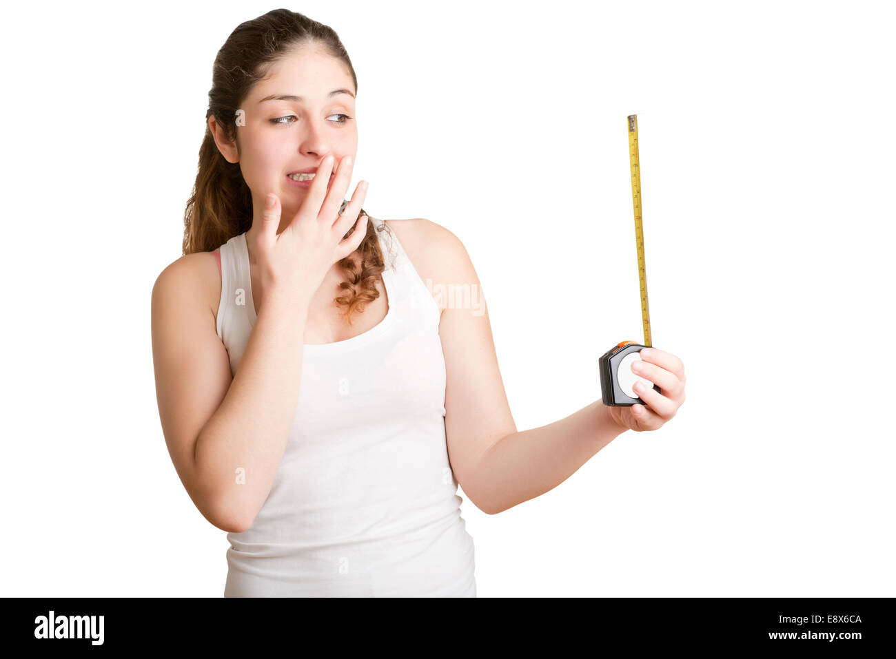 Concept of a girl looking at a man with a big penis with a measuring tape  in the hand Stock Photo - Alamy