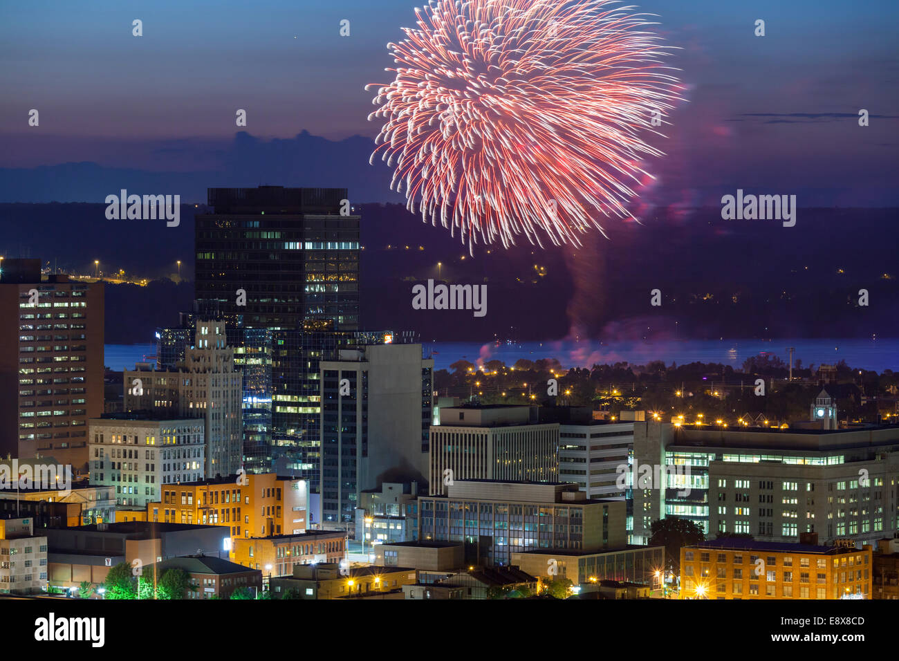 Fireworks over downtown Hamilton and Lake Ontario looking north from the escarpment, Ontario