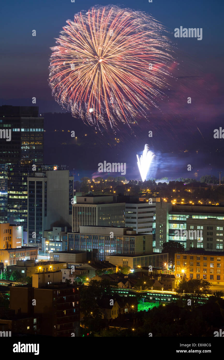 Fireworks over downtown Hamilton and Lake Ontario looking north from the escarpment, Ontario