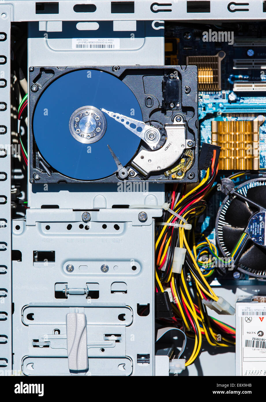 A close-up of hard disk data storage drive in a PC home computer from 2007 Stock Photo