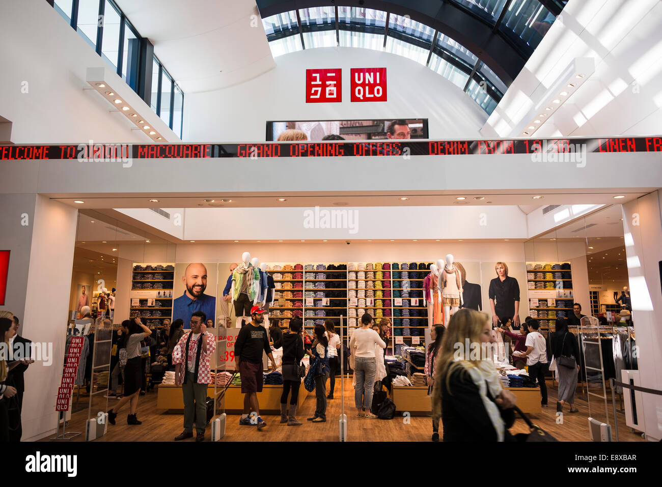 Sydney, Australia. 16th October, 2014. H&M staff welcome new customers to  its first store in Sydney. Five international high street retailers rushed  to open new stores on the same day. Credit: MediaServicesAP/Alamy