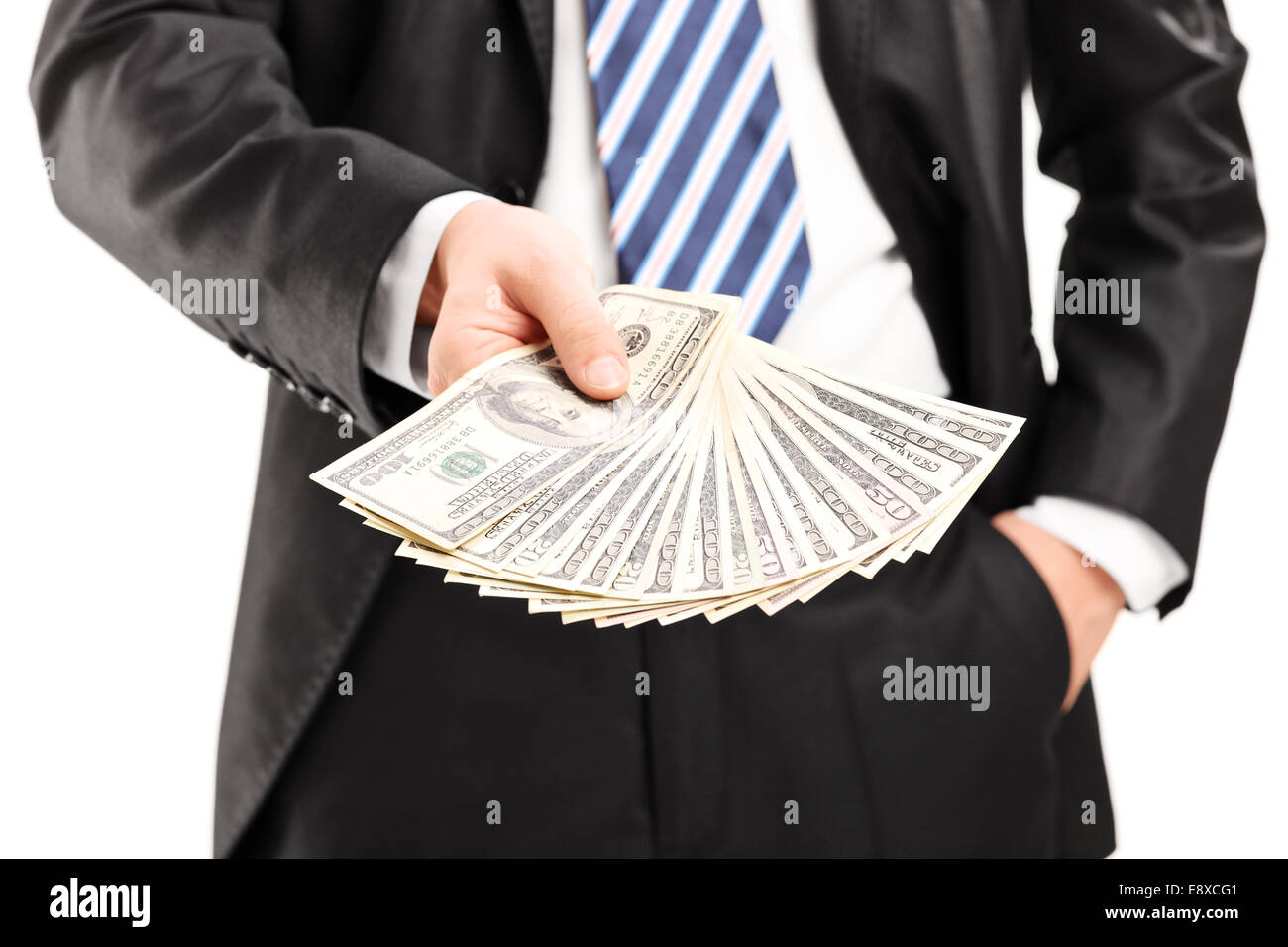 Close-up on a businessman holding money isolated on white background ...