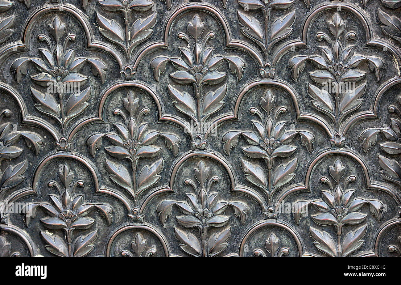 Brass, historical importance, decorated design in the door of red fort one of the world heritage site of India. Stock Photo