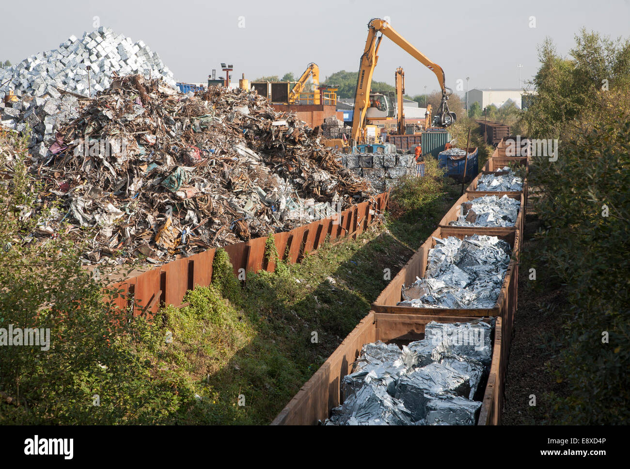 Scrap metal recycling loading train wagons with processed metals, EMR