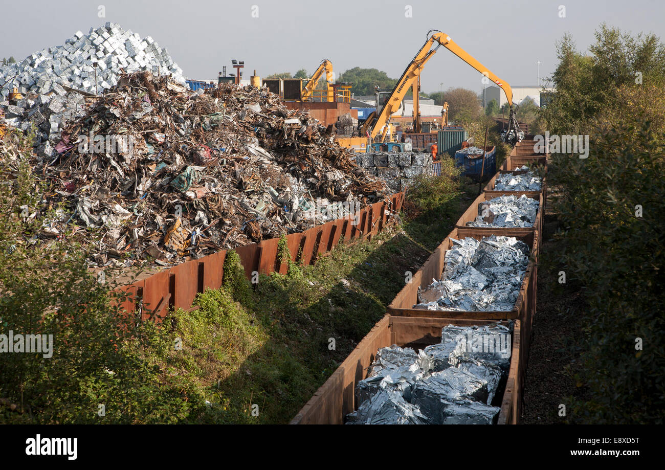 Scrap metal recycling loading train wagons with processed metals, EMR