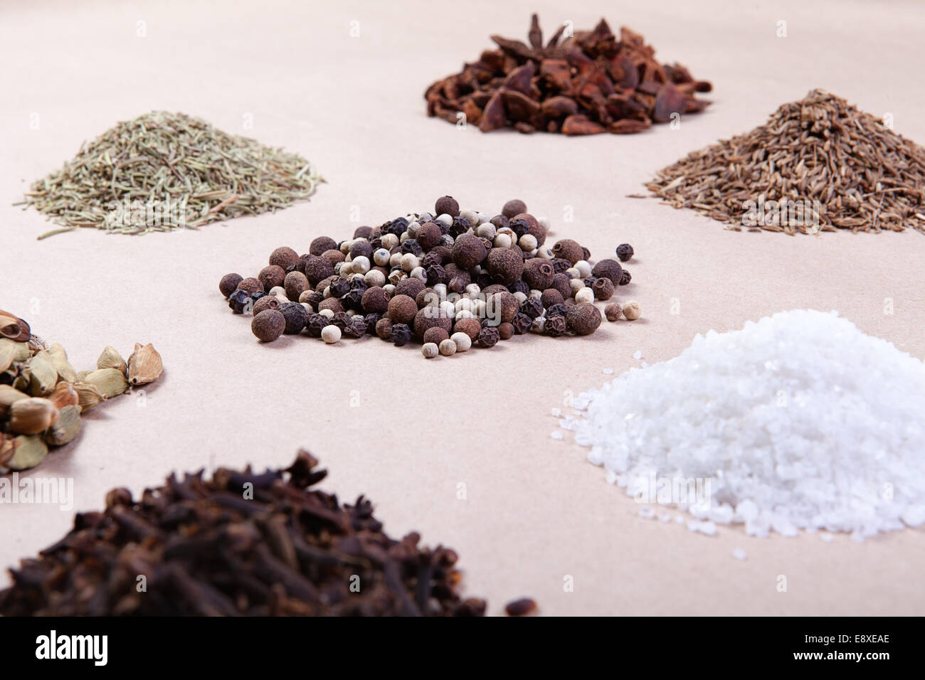 Large spice selection, isolated over paper background Stock Photo