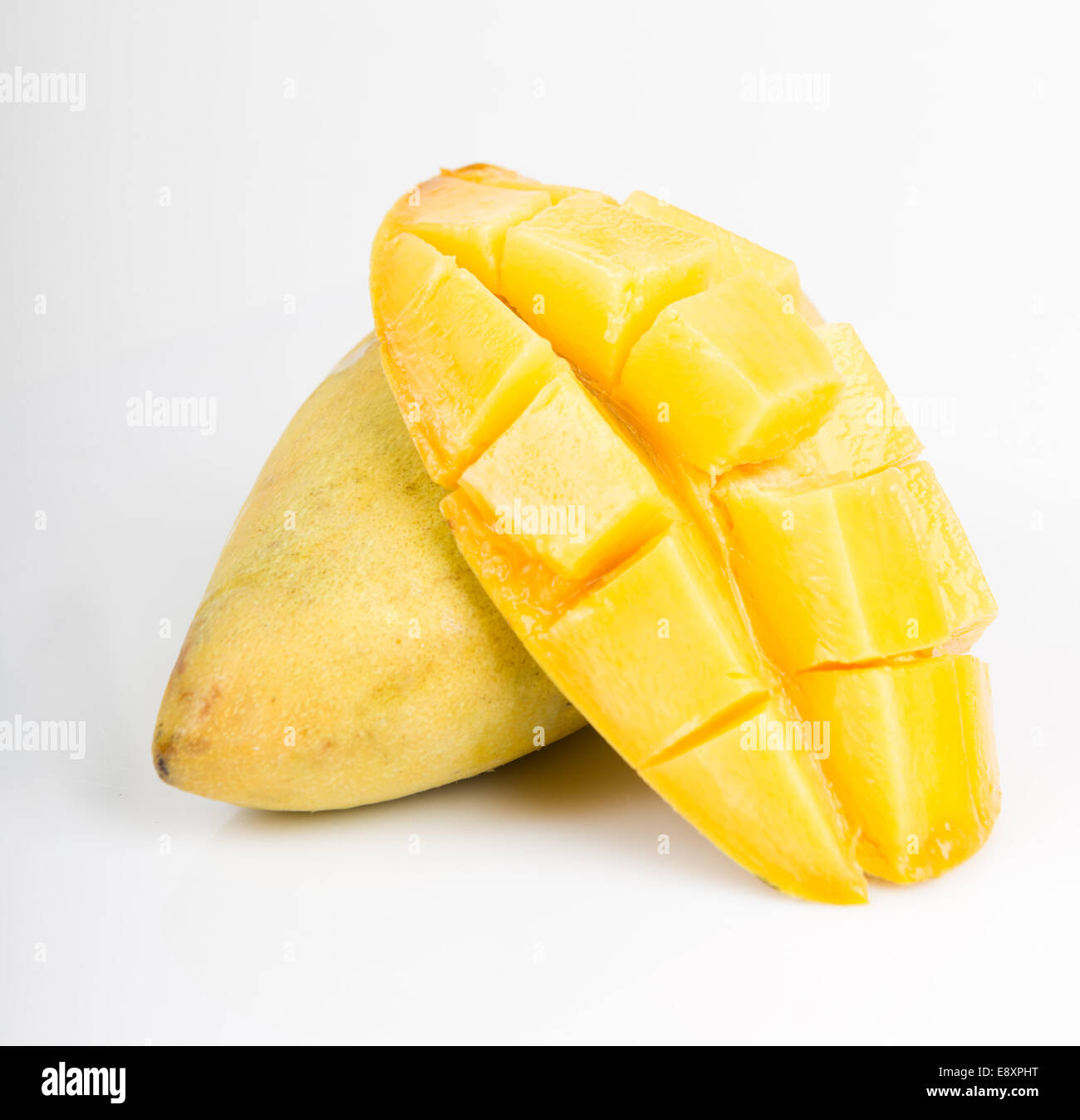 ripe mango on white background Stock Photo - Alamy