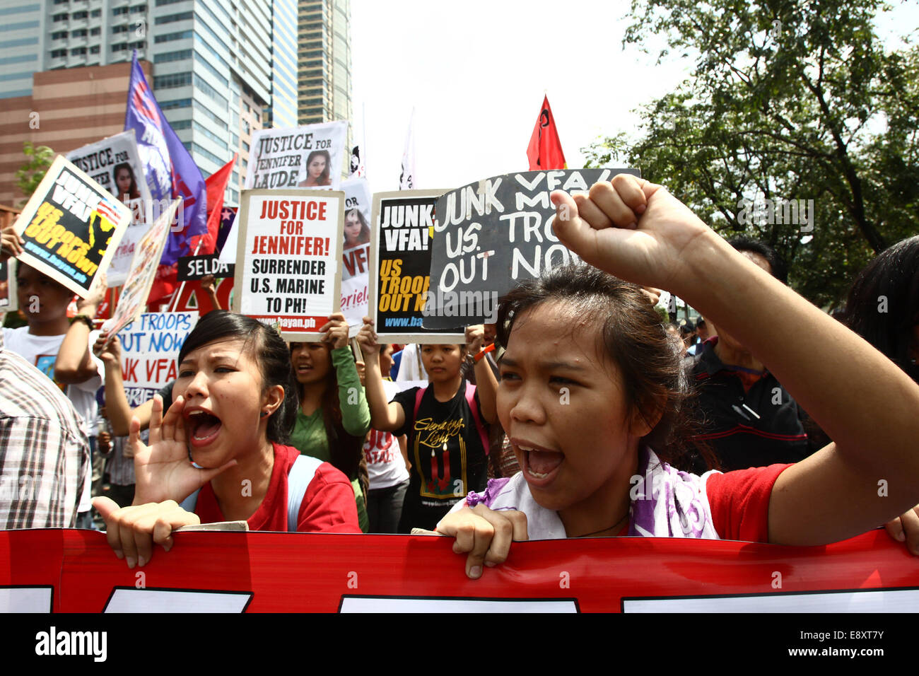 Manila, Philippines. 16th Oct, 2014. Activists shout slogans during a protest rally in front of the US Embassy in Manila, Philippines, Oct. 16, 2014. The protesters demand justice for Jeffrey Laude, who was suspected to be killed by US Marine Joseph Scott Pemberton last Saturday in Olongapo City. Credit:  Rouelle Umali/Xinhua/Alamy Live News Stock Photo