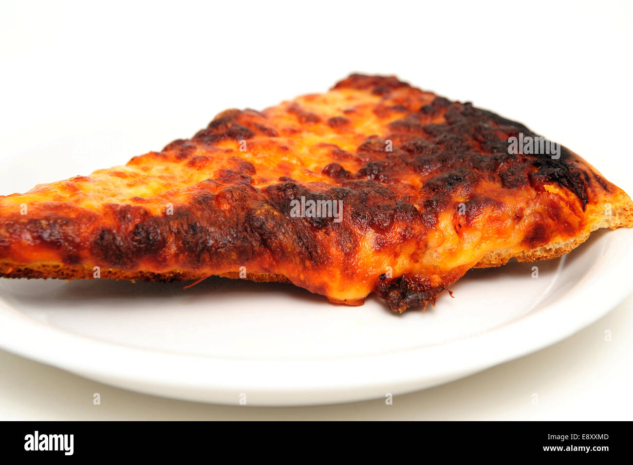 Re-heated Burnt Pizza Stock Photo