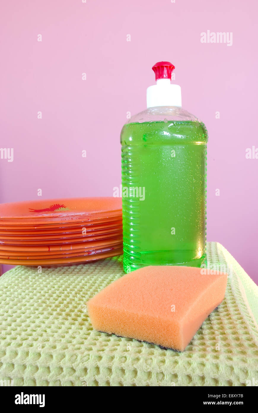 Dishwashing liquid and clean plates Stock Photo Alamy