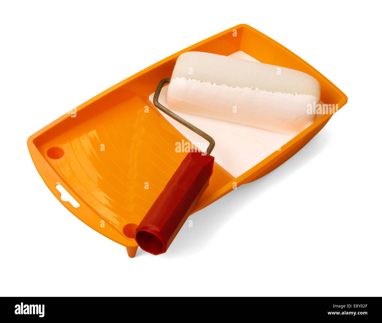 paint roller in tray of paint Stock Photo