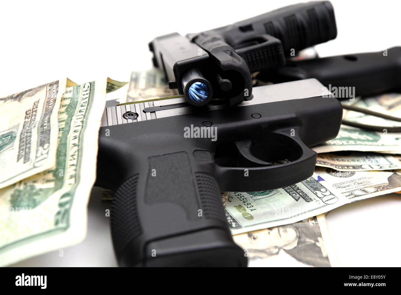 Handguns And Cash Stock Photo