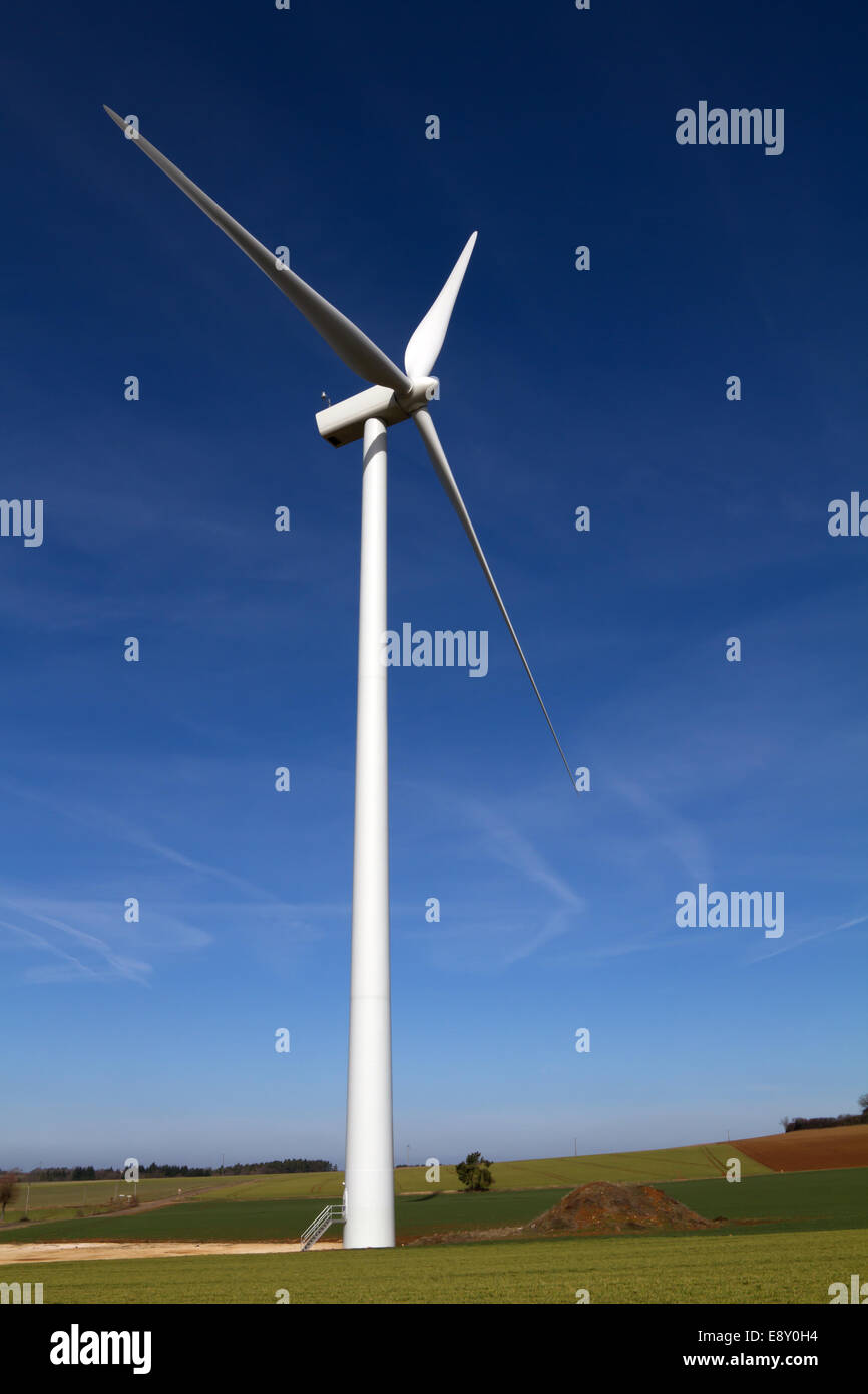 Wind turbine on clear blue sky Stock Photo Alamy