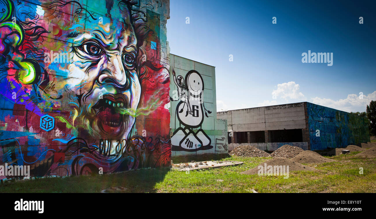 Artworks by C215,'Face your own fears', and the London Police, 'Happy Rider' produced for the Bratislava street art festival 201 Stock Photo