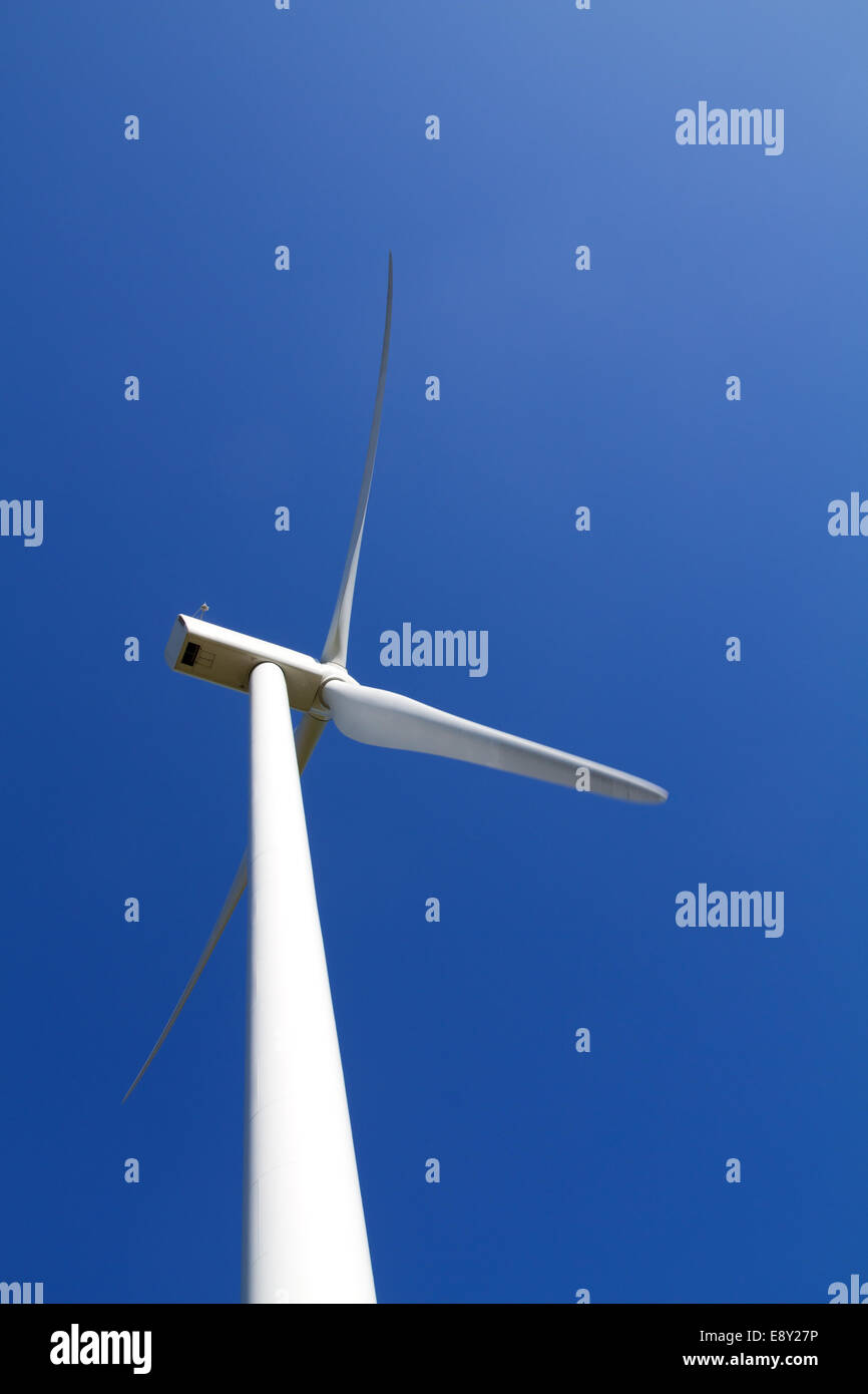 Wind turbine on clear blue sky Stock Photo - Alamy