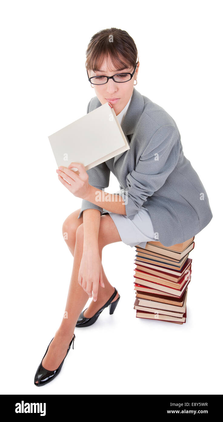 woman and a pile of books Stock Photo - Alamy